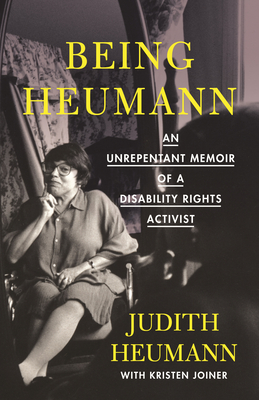 the cover of being heumann, an unrepentant memoir of a disability rights activist by judith heumann with kristen joiner. a portrait of the author in repose. She uses a wheelchair. 